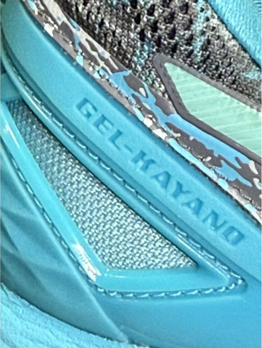 ASICS Gel-Kayano running shoes in a gray/blue/turquoise colorway, Women’s US 7.5